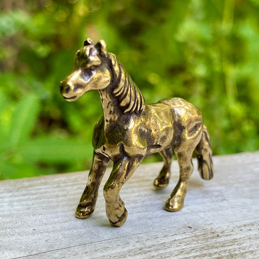 Artisan-crafted brass horse statue, perfect for equestrian lovers, rustic home decor, or unique collectible gifts.