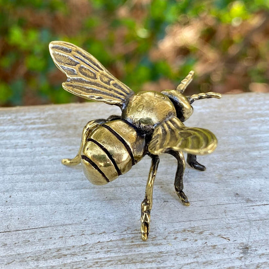 Solid brass bee figurine by Wild Brass, symbol of harmony and beauty, showcasing intricate detailing and a polished finish.